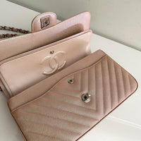 CHANEL Metallic Caviar Chevron Quilted Medium Double Flap Light Gold