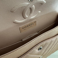 CHANEL Metallic Caviar Chevron Quilted Medium Double Flap Light Gold