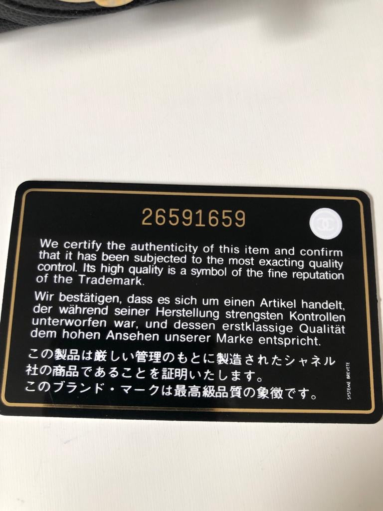 CHANEL Caviar Black Chevron Classic Flap Mini GHW