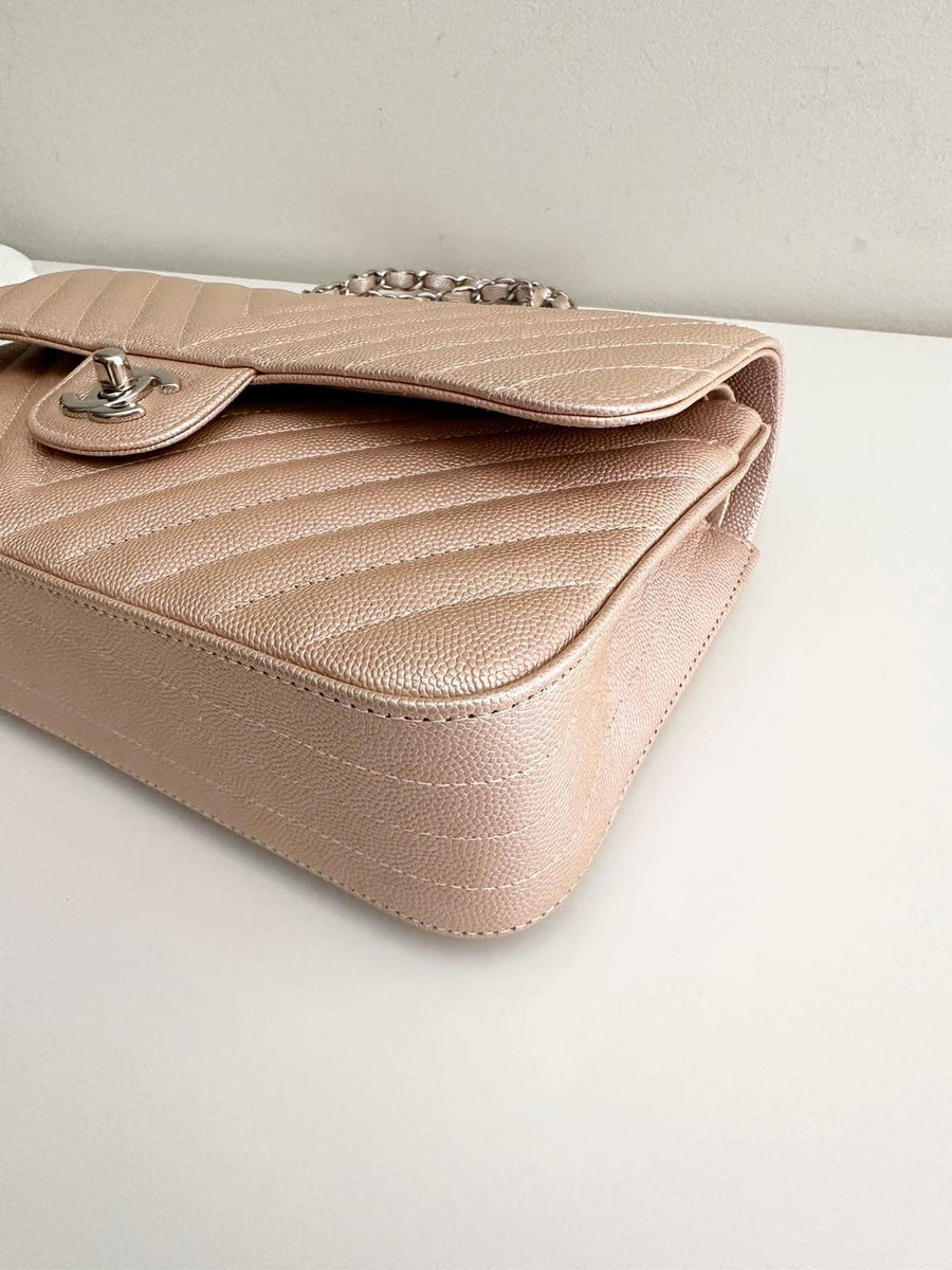 CHANEL Metallic Caviar Chevron Quilted Medium Double Flap Light Gold